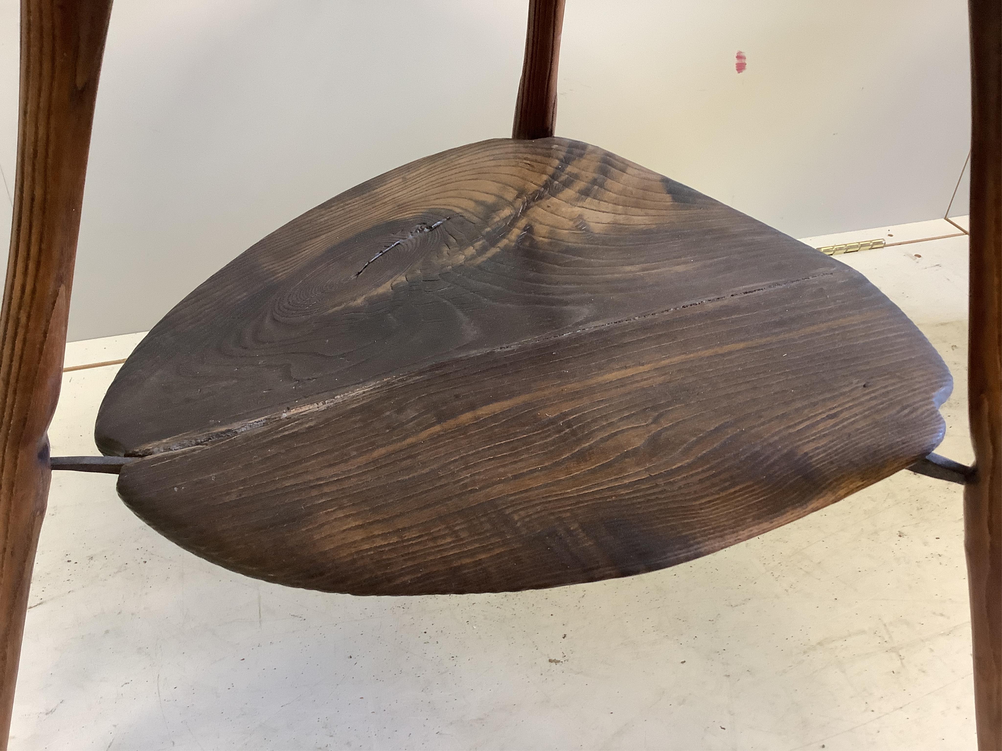 An unusual 18th century weathered elm cricket table, width 61cm, height 60cm. Condition - fair to good
